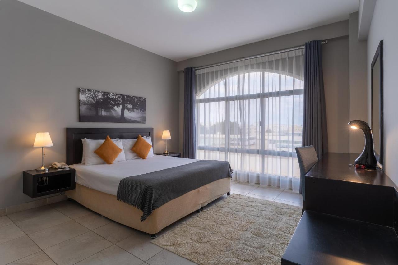 Midan Hotel Suites Маскат Екстериор снимка